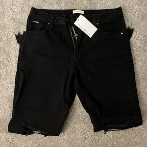 NWT size 9 black straight legged ripped jeans